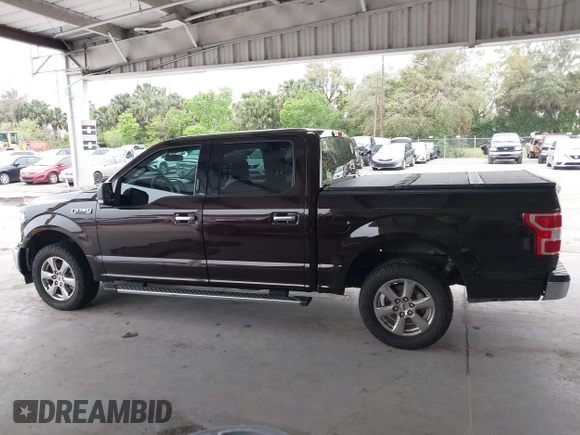 2019 Ford F-150 XL with VIN 1FTEW1CB6KKC92946, listed as a IAAI auction lot 41652249 with 133,883 mi miles and . Bid and sale history available at carsss.com. Image 14.