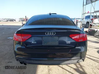 2016 Audi A5 Premium Plus z VIN WAUM2AFR1GA057428, wystawiony jako IAAI lot #41908949 z przebiegiem 103 478 mil mil oraz . Historia ofert i sprzedaży dostępna na DreamBid. Obrazek 16.
