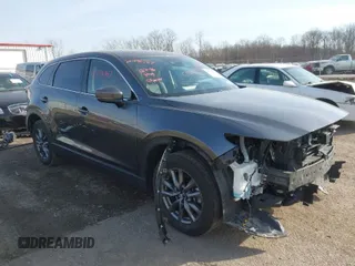 2023 Mazda CX-9 Touring with VIN JM3TCBCY7P0653136, listed as a IAAI auction lot 41796367 with 32,766 mi miles. Bid and sale history available at carsss.com. Image 1.