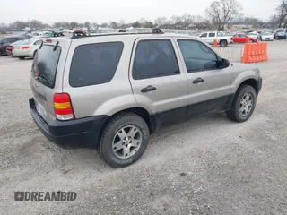 2001 Ford Escape with VIN 1FMUU01B61KE00524, listed as a IAAI auction lot 41486950 with 163,753 mi miles and . Bid and sale history available at DreamBid. Image 4.
