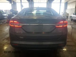2018 Ford Fusion SE with VIN 3FA6P0PUXJR123360, listed as a Copart auction lot 65339715 with 113,635 mi miles and Salvage title. Bid and sale history available at DreamBid. Image 6.