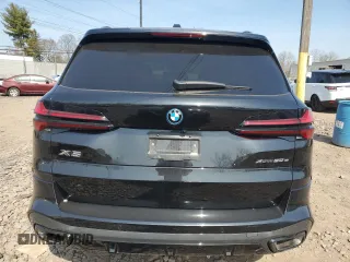 2024 BMW X5 xDrive50e z VIN 5UX43EU09R9U51760, wystawiony jako Copart lot #49055155 z przebiegiem 7199 mil mil oraz Szkody całkowita. Historia ofert i sprzedaży dostępna na DreamBid. Obrazek 6.