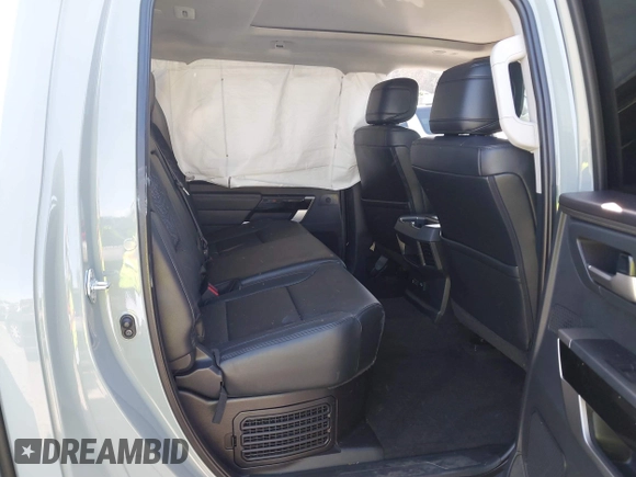 2022 Toyota Tundra Limited Hybrid with VIN 5TFJC5EC9NX001528, listed as a IAAI auction lot 41625774 with 57,475 mi miles and . Bid and sale history available at DreamBid. Image 8.