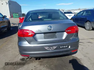 2014 Volkswagen Jetta S z VIN 3VW2K7AJ7EM275448, wystawiony jako IAAI lot #41835358 z przebiegiem 149 272 mil mil oraz . Historia ofert i sprzedaży dostępna na DreamBid. Obrazek 16.
