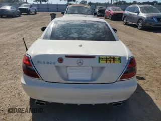 2009 Mercedes-Benz SLK-Class 3.0L with VIN WDBWK54F79F209339, listed as a Copart auction lot 77400294 with 68,540 mi miles and Salvage Title. Bid and sale history available at carsss.com. Image 6.