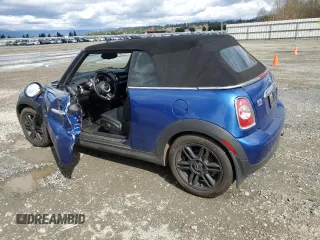 2014 MINI Convertible with VIN WMWZN3C55ET861078, listed as a Copart auction lot 50240665 with 50,541 mi miles and Salvage Title. Bid and sale history available at DreamBid. Image 2.
