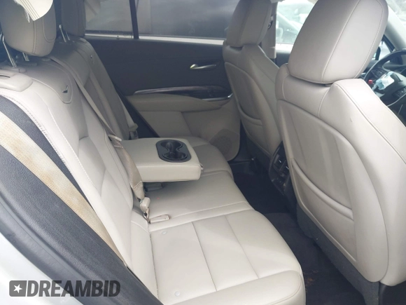 2019 Cadillac XT4 FWD Luxury z VIN 1GYAZAR43KF160132, wystawiony jako IAAI lot #41941512 z przebiegiem 68 835 mil mil oraz . Historia ofert i sprzedaży dostępna na DreamBid. Obrazek 8.