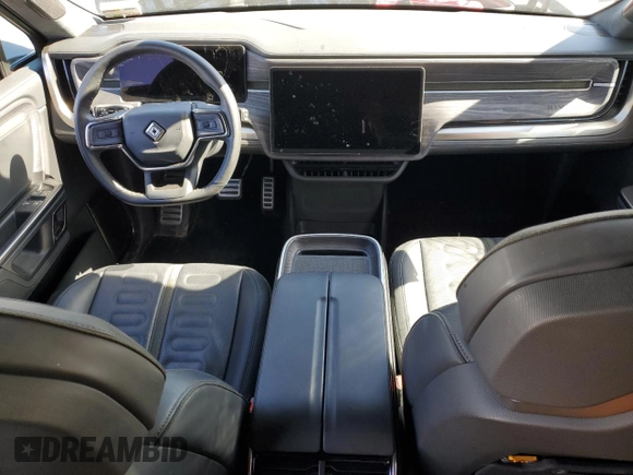 2023 Rivian R1S Adventure z VIN 7PDSGABA3PN018823, wystawiony jako Copart lot #53184595 z przebiegiem 36 677 mil mil oraz Szkoda całkowita • Salvage title. Historia ofert i sprzedaży dostępna na DreamBid. Obrazek 8.
