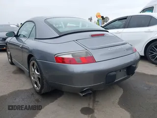 2001 Porsche 911 with VIN WP0CA29951S653789, listed as a IAAI auction lot 42333738 with 67,126 mi miles and . Bid and sale history available at DreamBid. Image 3.