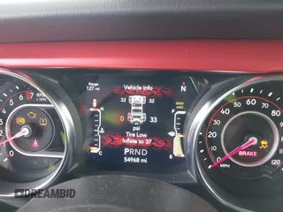 2021 Jeep Wrangler Unlimited Rubicon z VIN 1C4HJXFG0MW575473, wystawiony jako IAAI lot #41681352 z przebiegiem 54 968 mil mil oraz . Historia ofert i sprzedaży dostępna na DreamBid. Obrazek 7.