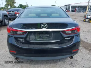 2016 Mazda Mazda6 i Touring with VIN JM1GJ1V53G1431880, listed as a IAAI auction lot 42079970 with 111,179 mi miles. Bid and sale history available at carsss.com. Image 16.