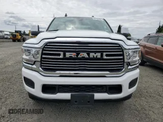 2023 Ram 2500 Laramie with VIN 3C6UR5FJ1PG634158, listed as a Copart auction lot 57164505 with 18,279 mi miles and Salvage title. Bid and sale history available at DreamBid. Image 5.