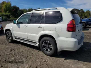 2004 Lexus GX 470 with VIN JTJBT20XX40033938, listed as a Copart auction lot 70871164 with 214,565 mi miles and Salvage Title. Bid and sale history available at carsss.com. Image 2.