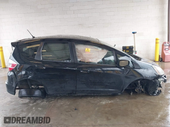2013 Honda Fit Sport with VIN JHMGE8H57DC033384, listed as a IAAI auction lot 41871356 with 150,777 mi miles. Bid and sale history available at carsss.com. Image 12.