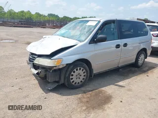 2004 Honda Odyssey LX with VIN 5FNRL18504B129349, listed as a IAAI auction lot 42393492 with 243,232 mi miles and . Bid and sale history available at DreamBid. Image 2.
