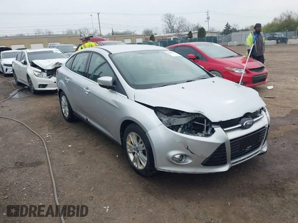 2012 Ford Focus SEL with VIN 1FAHP3H28CL266719, listed as a IAAI auction lot 42008714 with 169,880 mi miles. Bid and sale history available at carsss.com. Image 1.