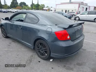 2005 Scion tC with VIN JTKDE177950042663, listed as a IAAI auction lot 42120575 with 255,225 mi miles. Bid and sale history available at carsss.com. Image 3.