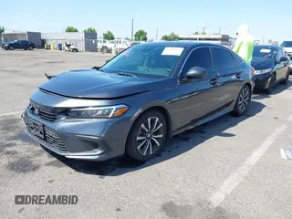 2023 Honda Civic EX with VIN 2HGFE1F74PH323979, listed as a IAAI auction lot 42499373 with 70,326 mi miles and . Bid and sale history available at DreamBid. Image 17.