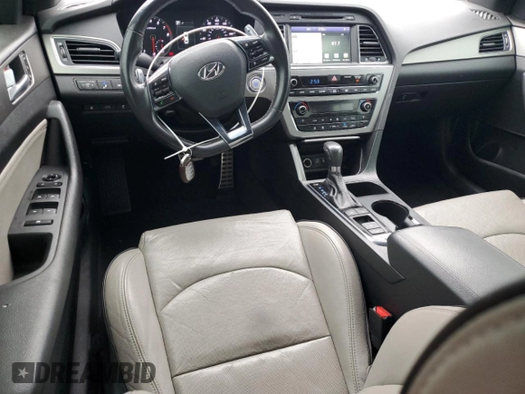 2015 Hyundai Sonata Sport z VIN 5NPE34AB3FH077882, wystawiony jako Copart lot #48311875 z przebiegiem 129 222 mil mil oraz Czysty tytuł • Clean title. Historia ofert i sprzedaży dostępna na DreamBid. Obrazek 8.