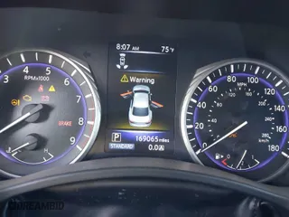 2016 Infiniti Q50 3.0t Premium with VIN JN1EV7AP8GM306347, listed as a IAAI auction lot 42013538 with 199,065 mi miles. Bid and sale history available at carsss.com. Image 7.