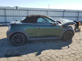 2013 MINI Roadster z VIN WMWSY1C50DT625093, wystawiony jako Copart lot #72423424 z przebiegiem 104 620 mil mil oraz Szkody całkowita. Historia ofert i sprzedaży dostępna na DreamBid. Obrazek 3.