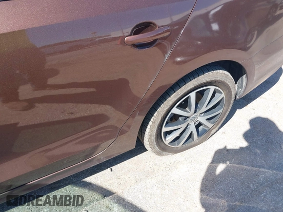 2016 Volkswagen Jetta Sedan 1.4T SE with VIN 3VWD67AJ2GM340416, listed as a IAAI auction lot 41663211 with 157,283 mi miles. Bid and sale history available at carsss.com. Image 6.
