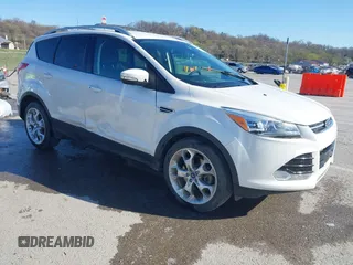 2013 Ford Escape Titanium with VIN 1FMCU0J96DUA71857, listed as a IAAI auction lot 41877003 with 118,864 mi miles and . Bid and sale history available at carsss.com. Image 1.