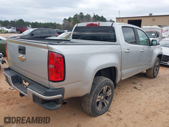 2018 Chevrolet Colorado 2WD Work Truck with VIN 1GCGSBEN5J1306373, listed as a IAAI auction lot 41843621 with 94,766 mi miles and . Bid and sale history available at DreamBid. Image 4.