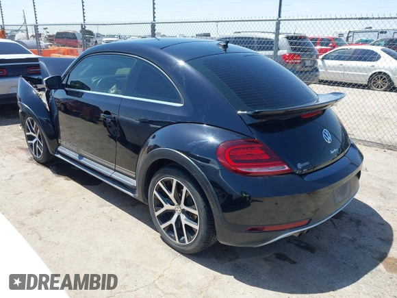 2018 Volkswagen Beetle Dune with VIN 3VWSD7AT1JM702354, listed as a IAAI auction lot 41993527 with 50,952 mi miles and . Bid and sale history available at DreamBid. Image 3.
