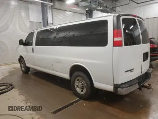 2014 Chevrolet Express Passenger LT with VIN 1GAZG1FG4E1176590, listed as a Copart auction lot 83660024 with 167,653 mi miles and Salvage title. Bid and sale history available at DreamBid. Image 2.