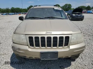 2000 Jeep Grand Cherokee Limited z VIN 1J4GW58N0YC272532, wystawiony jako Copart lot #57524225 z przebiegiem 238 921 mil mil oraz Szkoda całkowita • Salvage title. Historia ofert i sprzedaży dostępna na DreamBid. Obrazek 5.