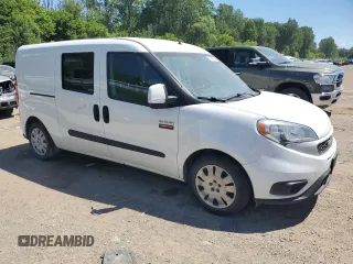 2019 Ram ProMaster City Cargo Tradesman SLT with VIN ZFBHRFBB3K6M32904, listed as a Copart auction lot 57041804 with 163,633 mi miles and Salvage Title. Bid and sale history available at DreamBid. Image 4.