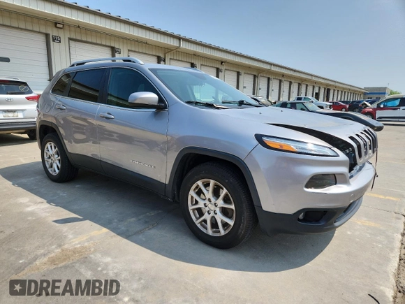 2016 Jeep Cherokee Altitude with VIN 1C4PJMCB5GW361408, listed as a Copart auction lot 58037875 with 134,808 mi miles and Salvage title. Bid and sale history available at DreamBid. Image 4.