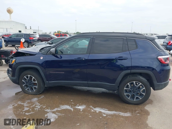 2019 Jeep Compass Trailhawk with VIN 3C4NJDDB8KT619330, listed as a IAAI auction lot 41237920 with 85,144 mi miles and . Bid and sale history available at DreamBid. Image 14.