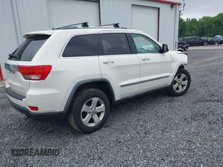 2011 Jeep Grand Cherokee Laredo with VIN 1J4RR4GG6BC680943, listed as a IAAI auction lot 42419575 with 188,672 mi miles and . Bid and sale history available at DreamBid. Image 4.