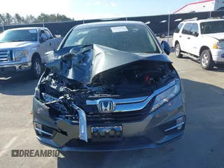 2020 Honda Odyssey Touring z VIN 5FNRL6H8XLB035047, wystawiony jako IAAI lot #41794343 z przebiegiem 57 537 mil mil oraz . Historia ofert i sprzedaży dostępna na DreamBid. Obrazek 12.