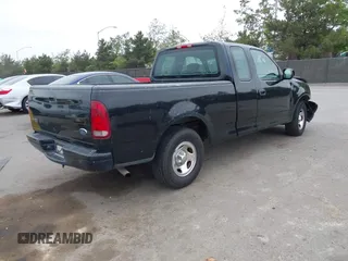 2002 Ford F-150 XL с VIN 1FTRX17242NB23323, выставлен на аукционе IAAI как лот 42363484 с пробегом Не указан миль и . История ставок и продаж доступна на DreamBid. Изображение 4.