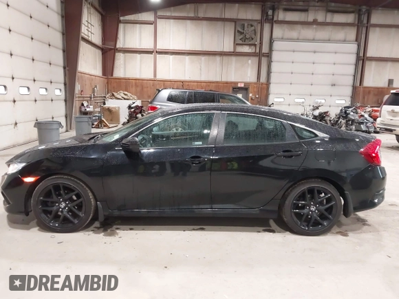 2019 Honda Civic Sport with VIN 2HGFC2F89KH557466, listed as a IAAI auction lot 42335216 with 138,747 mi miles and . Bid and sale history available at DreamBid. Image 14.
