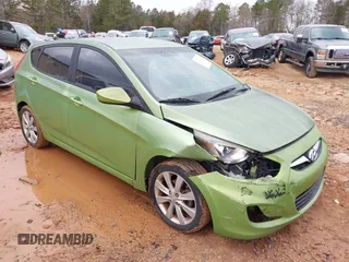 2012 Hyundai Accent SE z VIN KMHCU5AE8CU022927, wystawiony jako IAAI lot #41749321 z przebiegiem 258 185 mil mil oraz . Historia ofert i sprzedaży dostępna na DreamBid. Obrazek 1.