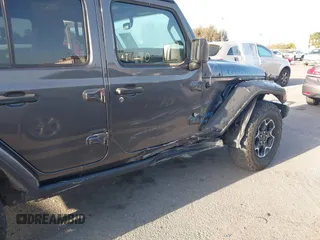 2023 Jeep Wrangler Rubicon with VIN 1C4JJXR67PW662277, listed as a IAAI auction lot 41950065 with 35,714 mi miles and . Bid and sale history available at DreamBid. Image 6.