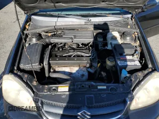 2006 Suzuki Forenza z VIN KL5JD56ZX6K278029, wystawiony jako Copart lot #82026904 z przebiegiem 117 700 mil mil oraz Szkody całkowita. Historia ofert i sprzedaży dostępna na DreamBid. Obrazek 11.