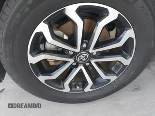 2023 Toyota Corolla Cross Hybrid S with VIN 7MUFBABG3PV001144, listed as a IAAI auction lot 42442124 with 116,674 mi miles and . Bid and sale history available at DreamBid. Image 6.
