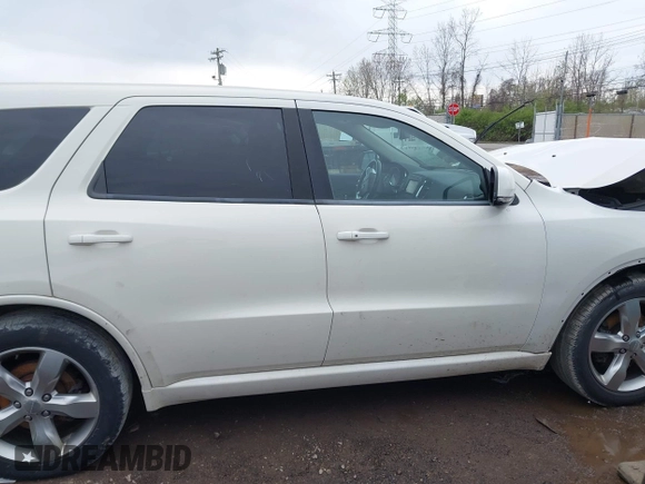 2012 Dodge Durango R/T with VIN 1C4SDJCT1CC195893, listed as a IAAI auction lot 41968863 with 201,388 mi miles and . Bid and sale history available at DreamBid. Image 13.