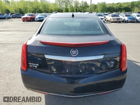 2014 Cadillac XTS z VIN 2G61L5S39E9298743, wystawiony jako Copart lot #53640375 z przebiegiem 77 382 mil mil oraz Szkody całkowita. Historia ofert i sprzedaży dostępna na DreamBid. Obrazek 6.