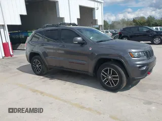 2018 Jeep Grand Cherokee Trailhawk with VIN 1C4RJFLG8JC427345, listed as a IAAI auction lot 41557222 with 49,469 mi miles. Bid and sale history available at carsss.com. Image 1.