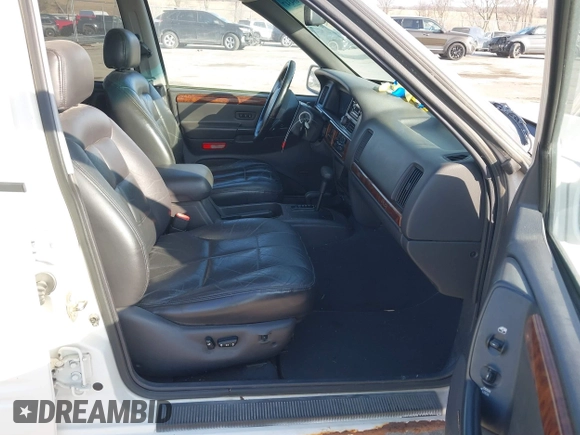 1997 Jeep Grand Cherokee Limited with VIN 1J4GZ78Y8VC769675, listed as a IAAI auction lot 41694347 with 113,834 mi miles. Bid and sale history available at carsss.com. Image 5.