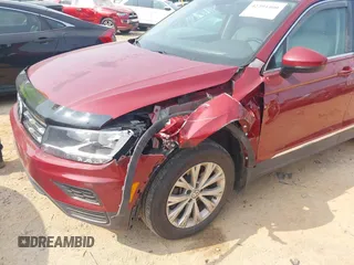 2018 Volkswagen Tiguan SEL with VIN 3VV3B7AX9JM054814, listed as a IAAI auction lot 42394400 with 92,160 mi miles and . Bid and sale history available at DreamBid. Image 6.