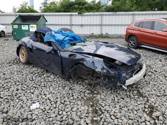 2000 Porsche Boxster S with VIN WP0CB2980YU660930, listed as a Copart auction lot 61270324 with 0 mi miles and Salvage Title. Bid and sale history available at carsss.com. Image 4.