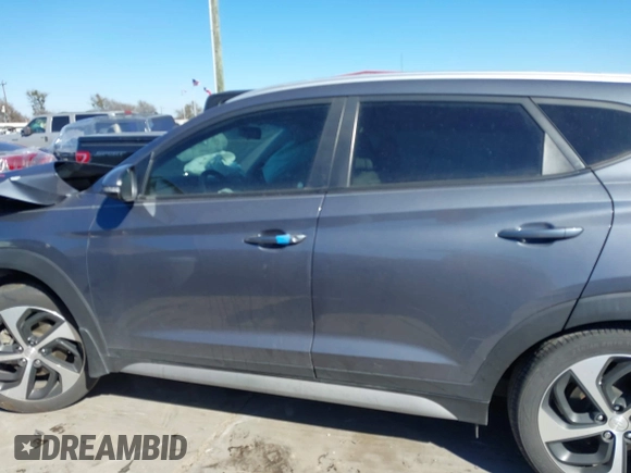 2018 Hyundai Tucson Sport with VIN KM8J33AL5JU770092, listed as a IAAI auction lot 41395349 with 101,395 mi miles. Bid and sale history available at carsss.com. Image 15.