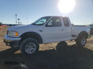 2000 Ford F-150 XL with VIN 1FTRX08L7YKA72511, listed as a Copart auction lot 80778694 with 163,654 mi miles and Salvage title. Bid and sale history available at DreamBid. Image 1.